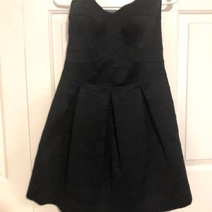 Strapless black mini dress
